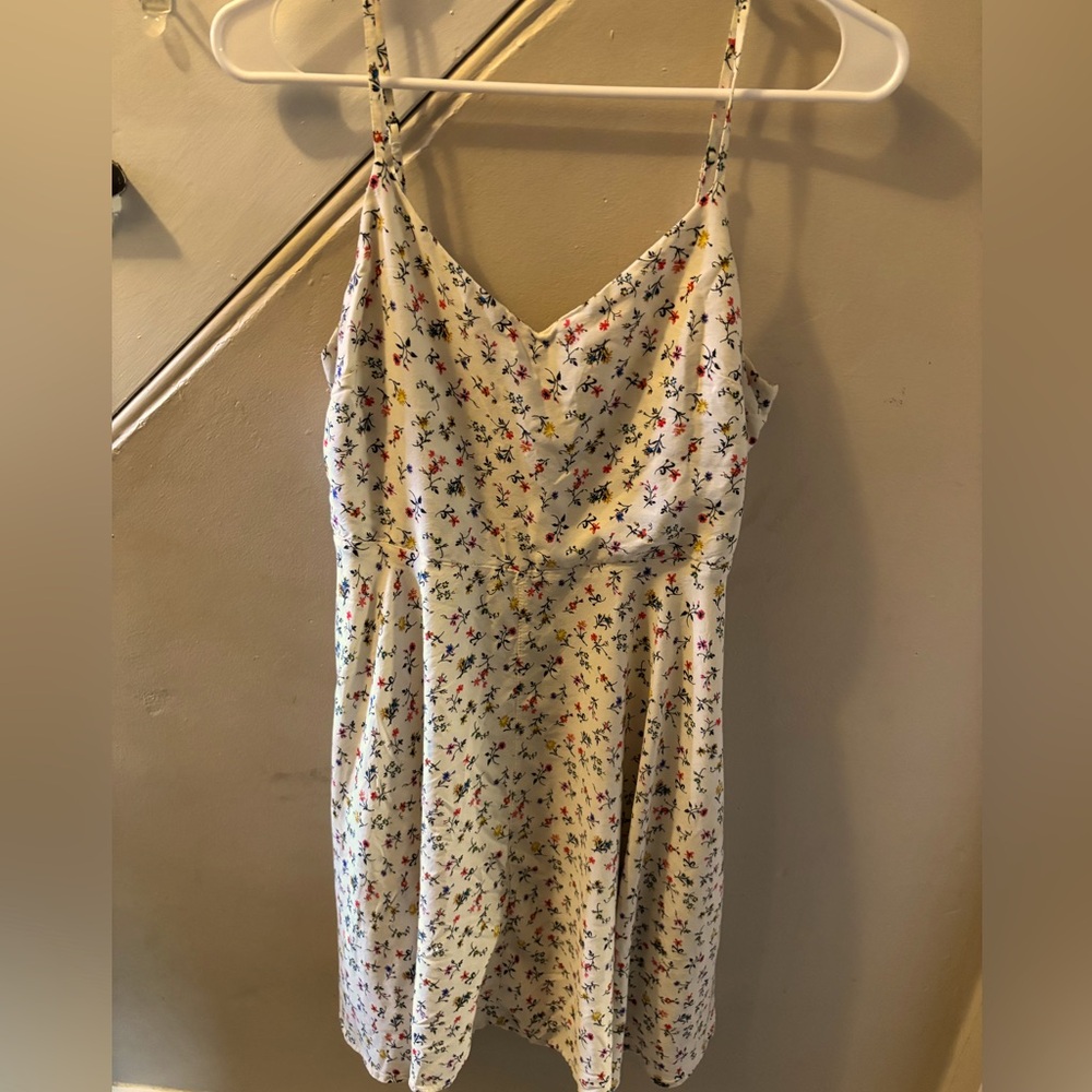 Sleeveless flowery dress size M. Knee length
